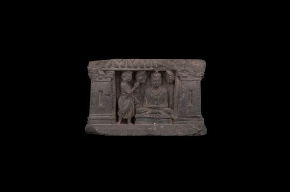 Image of Buddha and devotee