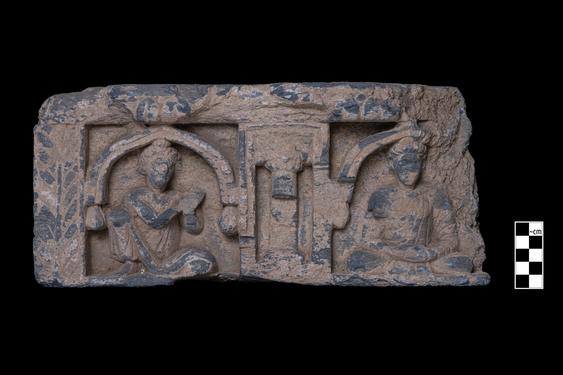 Image of Buddha and male devotee