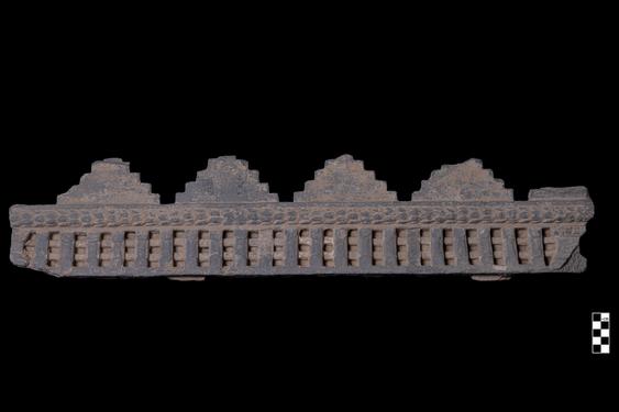 Image of Cornice of monument with stepped pyramids