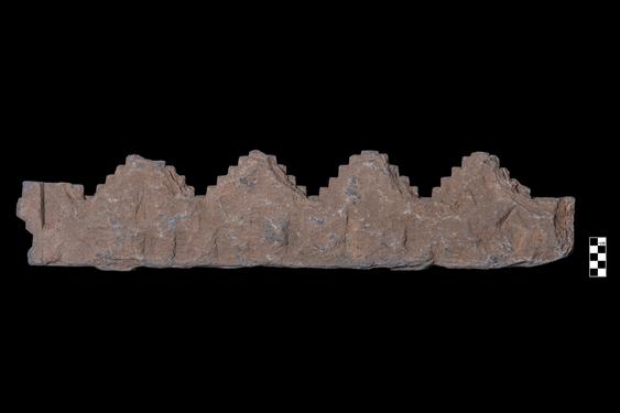 Image of Cornice of monument with stepped pyramids